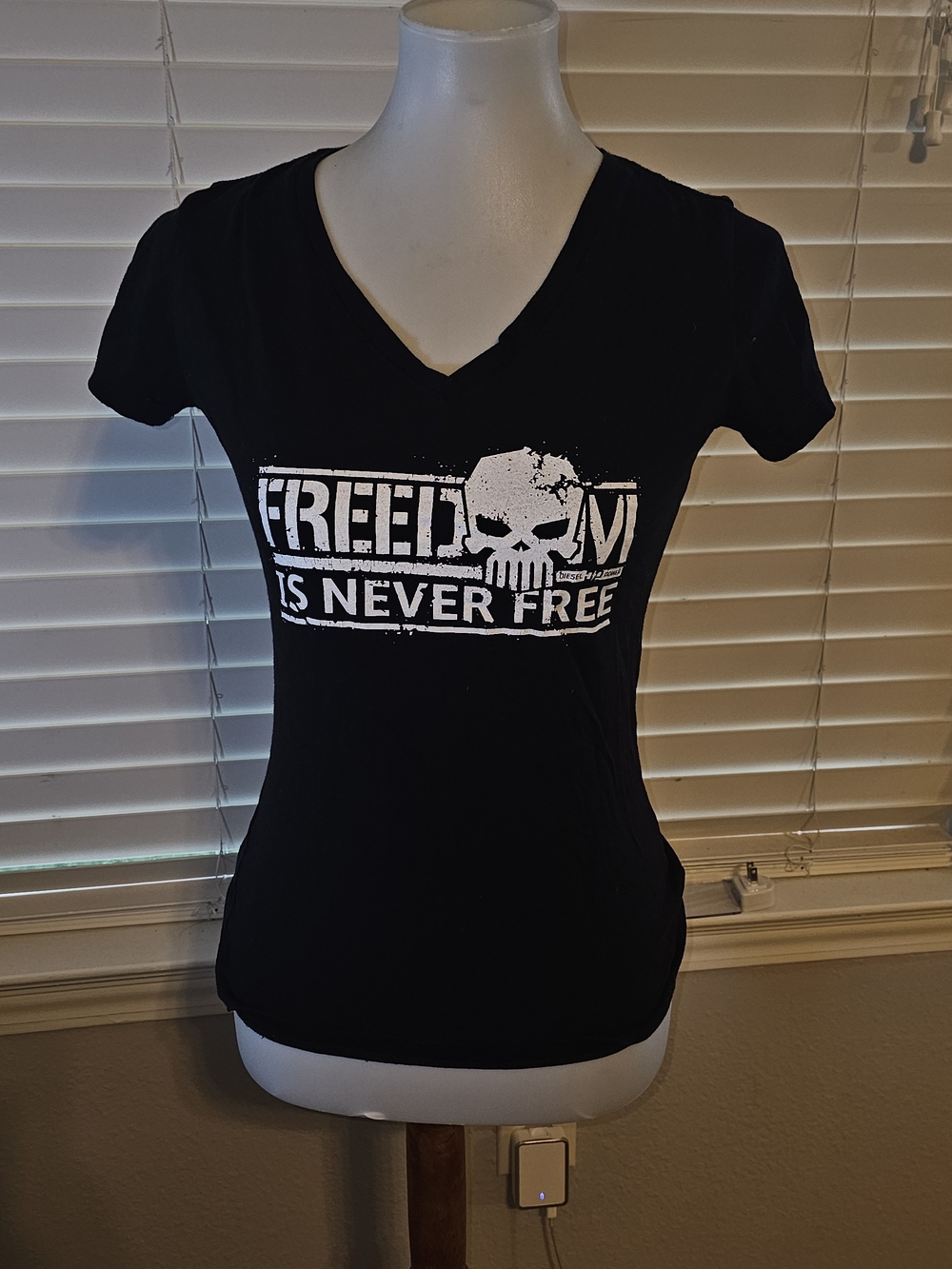 Black V-Neck Graphic Tee — Freedom Is Never Free